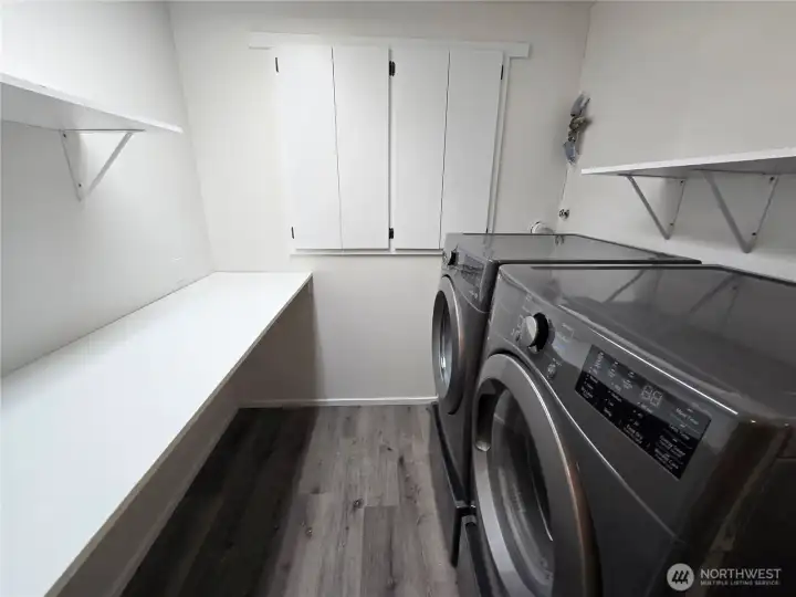 Laundry Room with shelving and Washer Dryer Combo