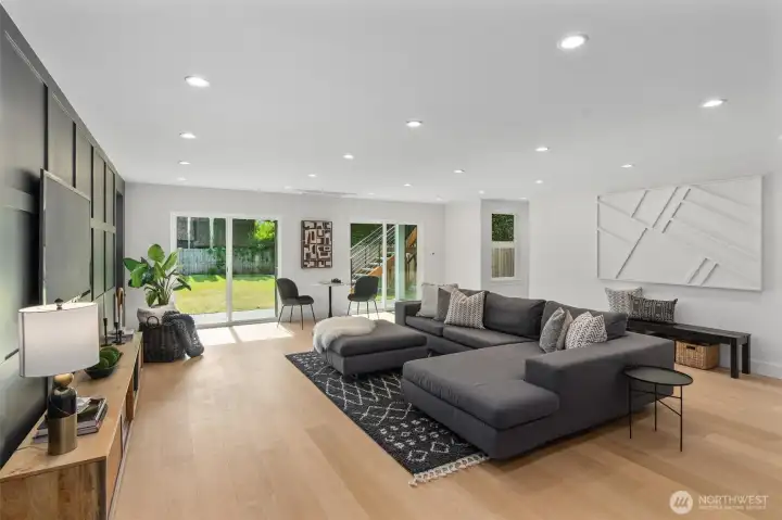 1st level family room. Walk out to sizable flat back yard. This level includes separate exterior entrance.