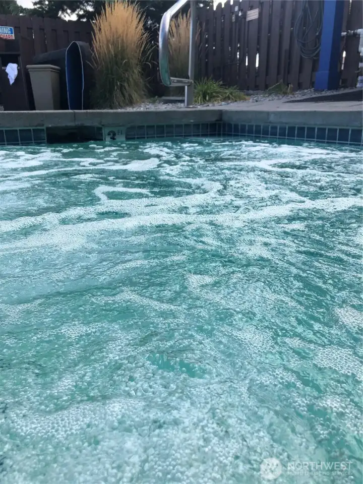 Outside community hot tub.  branded photo from Michael J Link