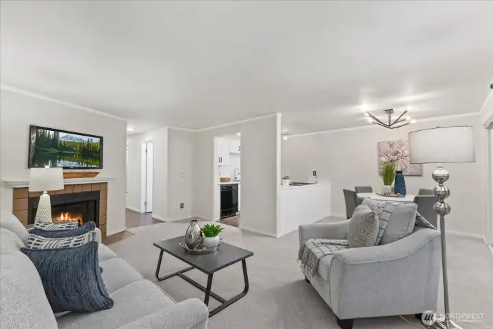 Spacious Living Area. Second floor Unit allows for natural light to flow through the Windows.