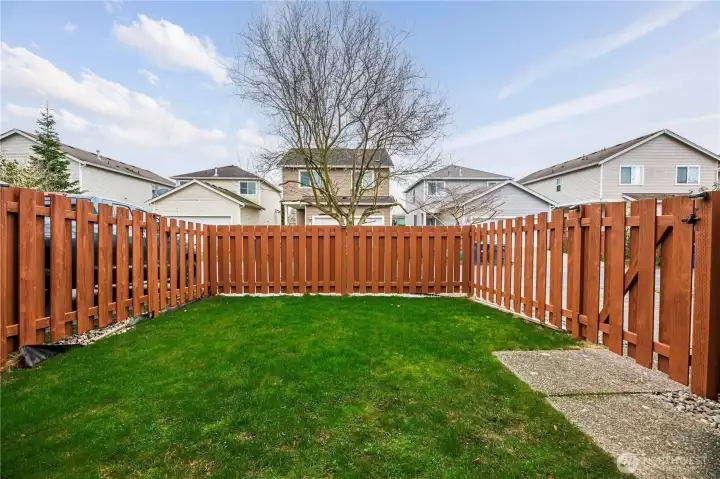 Fully fenced yard freshly painted 2025