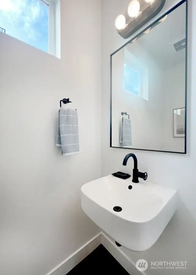 Coveted main floor powder room.