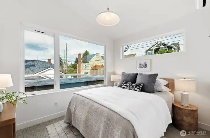 Second upstairs bedroom with en suite bathroom.