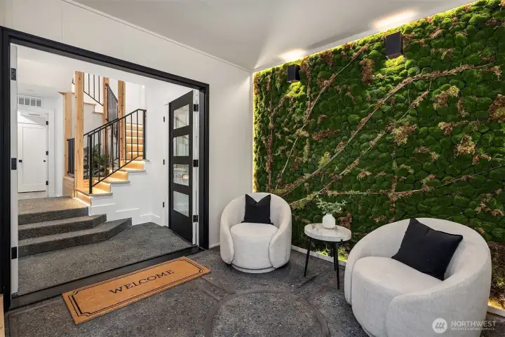 Covered Entrance with lighted moss wall