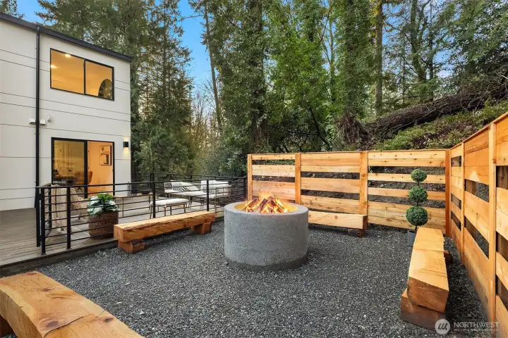 Large fire pit and bench seating