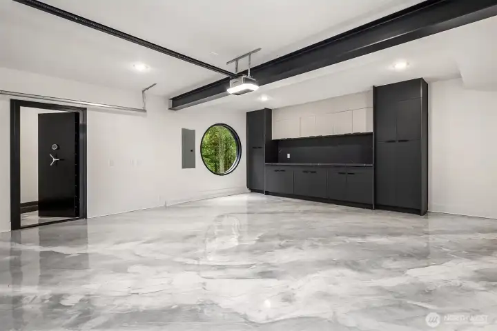 Epoxied floor, built-in cabinets and walk-in Safe