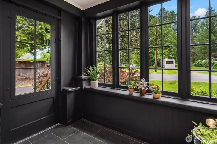 Enter through front porch.