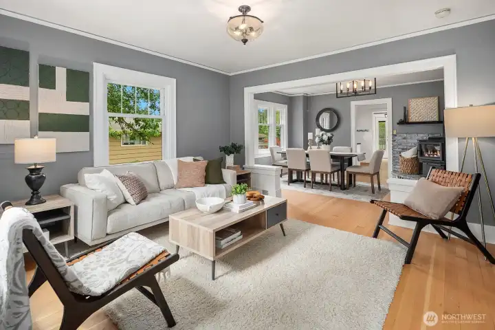 Living room with view to dining room and kitchen beyond.