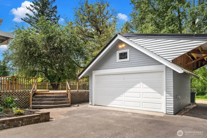 Garage with new carport built on.