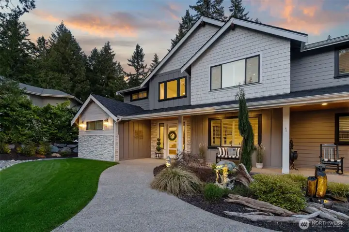 Walk by a fountain and landscape lighting on your way to the door.