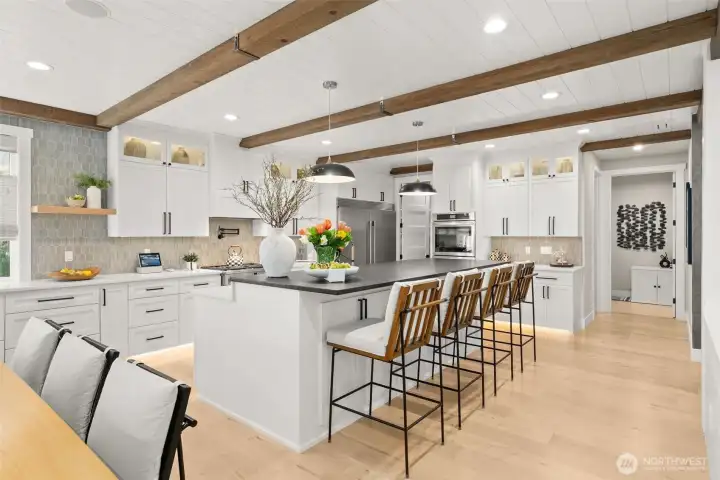 A chef's kitchen with ample storage and counter space.