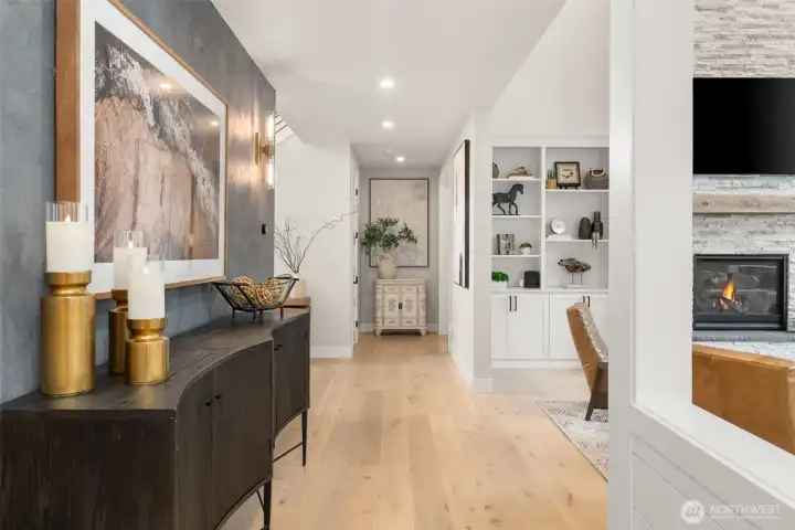 A Venetian plaster wall lines the hallway.