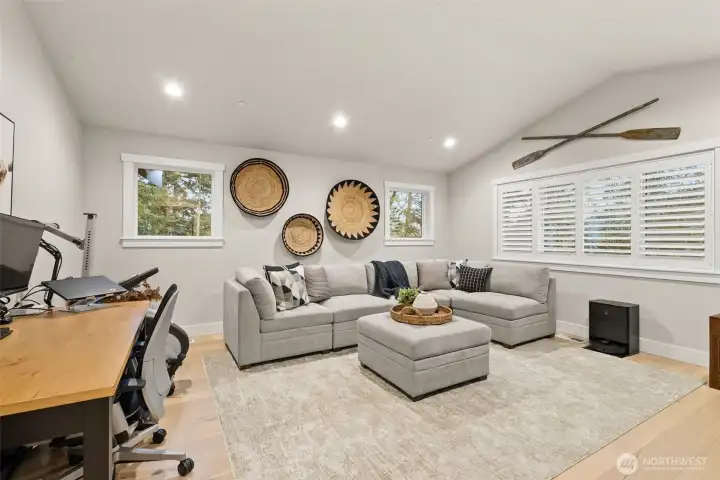 A large bonus room perfect for a movie or game night.