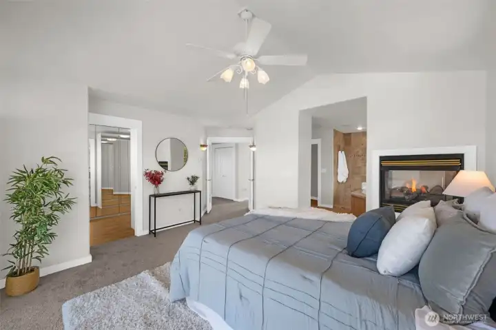 Primary with cozy gas fireplace.