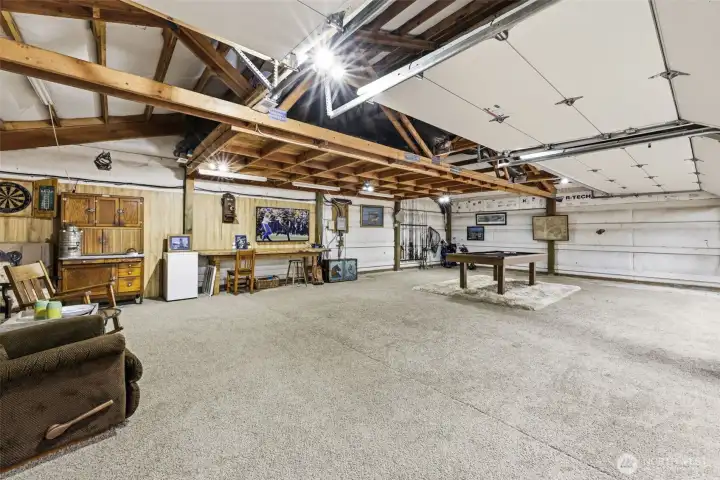 Another detached garage, holds 4 cars. Heated, perfect set-up for a game room or for that collector car enthusiast.