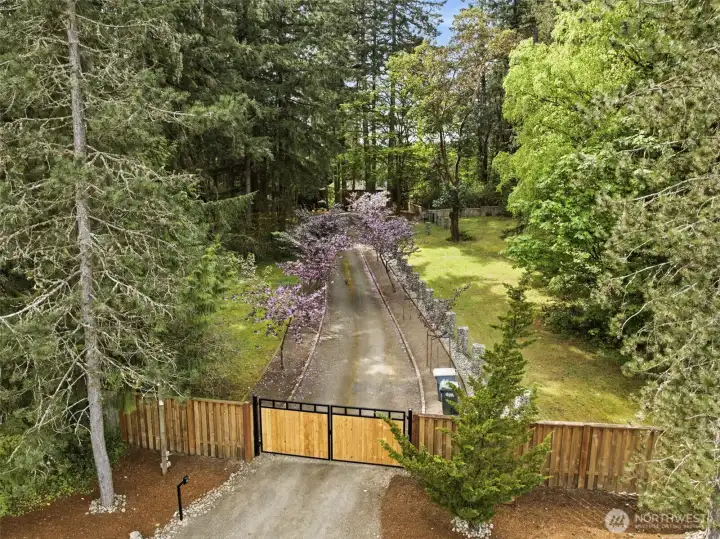 Nearly 3.5 acres of fenced, gated, and private grounds.