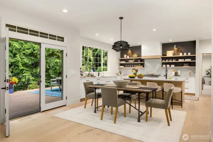 The newly redesigned epicurean kitchen leaves little to be desired, opening seamlessly to the family room and expansive Azek deck beyond.