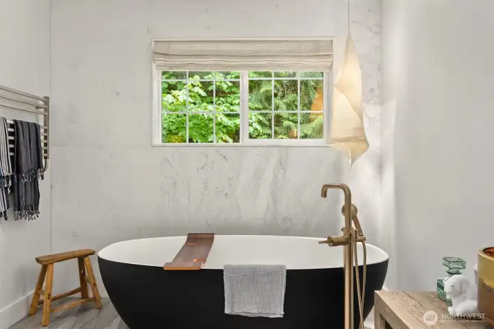 Victoria & Albert volcanic limestone freestanding tub.