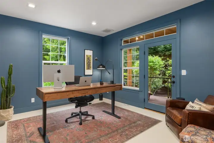 Main floor office with private access to deck.