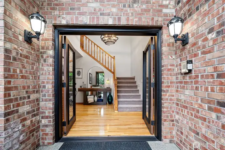 Front entry with double doors and stained glass windows Front entry with double doors and stained glass windows