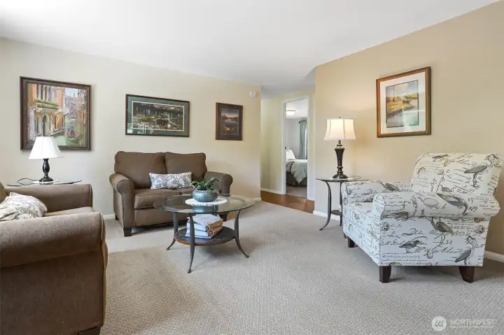 Formal living room and formal dining room with a built in hutch.