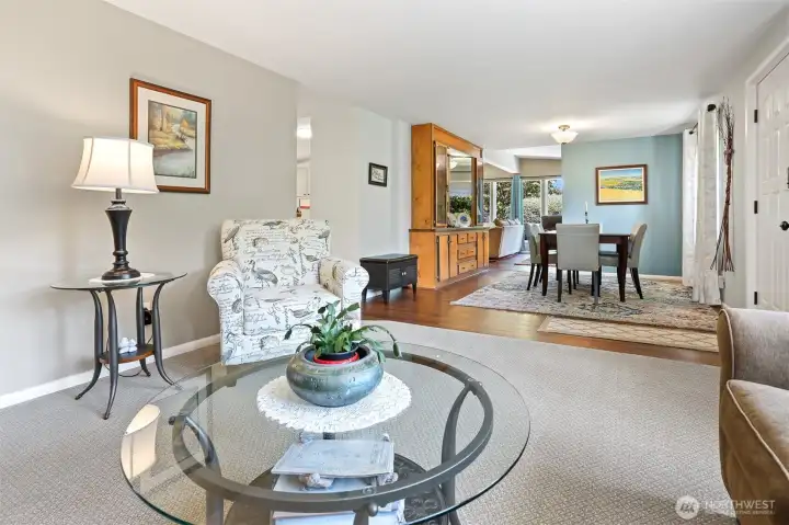 Formal living room and formal dining room with a built in hutch.