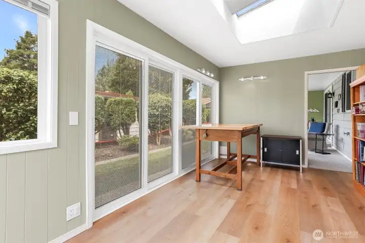 Light and bright bonus room adjacent to the sun room.   (Extra 400 sq ft not included in the home size per SCR)