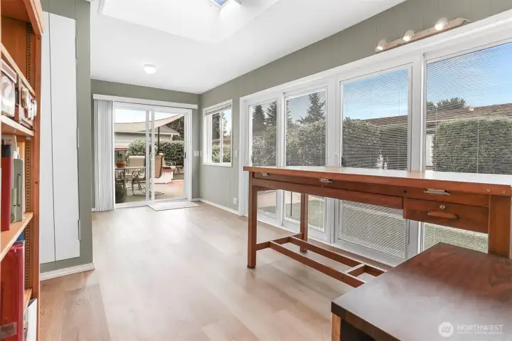 Light and bright bonus room adjacent to the sun room.   (Extra 400 sq ft not included in the home size per SCR)