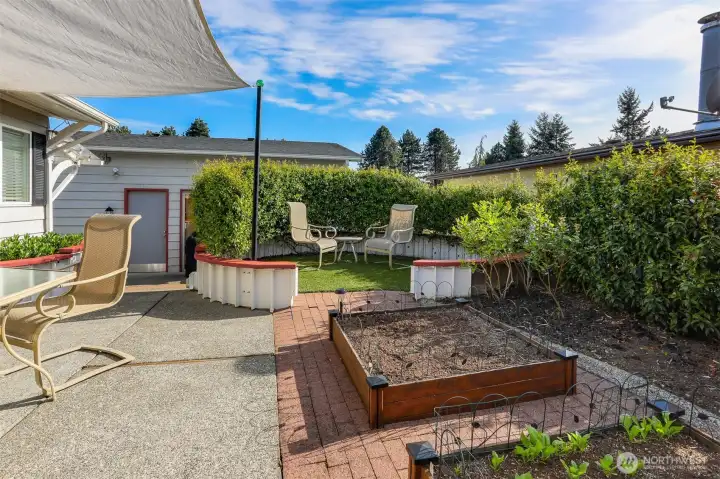 Back courtyard features 2nd of three private back patios accessed from the sun/bonus room.