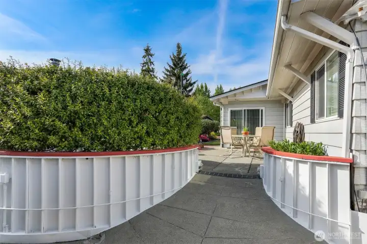 Back courtyard features 1 of three private back patios accessed from the sun/bonus room.