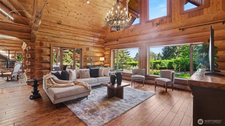 Embrace the rich wood finishes, soaring 25-foot ceilings, and walls of windows frame peaceful territorial views!