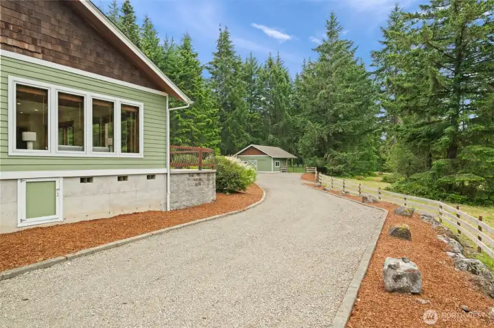 Barn can also be accessed from west side of home