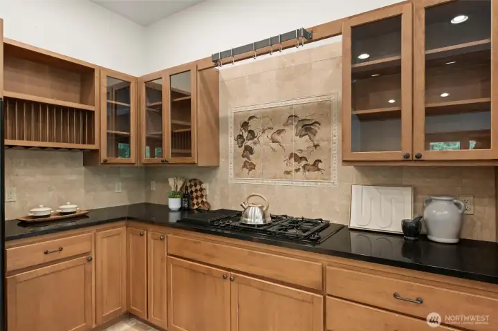 Granite counters and custom tilework