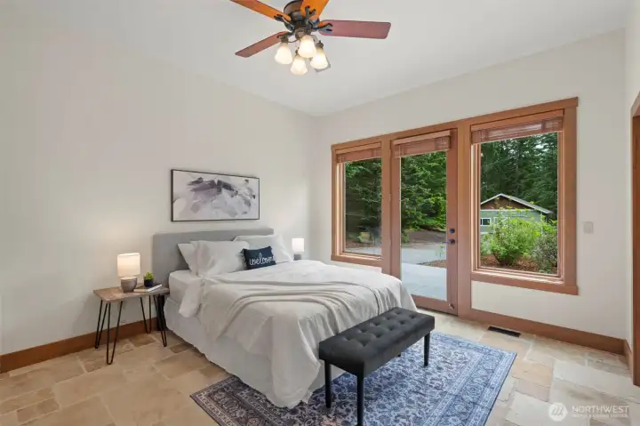 Primary suite with French door out to southern-exposure patio