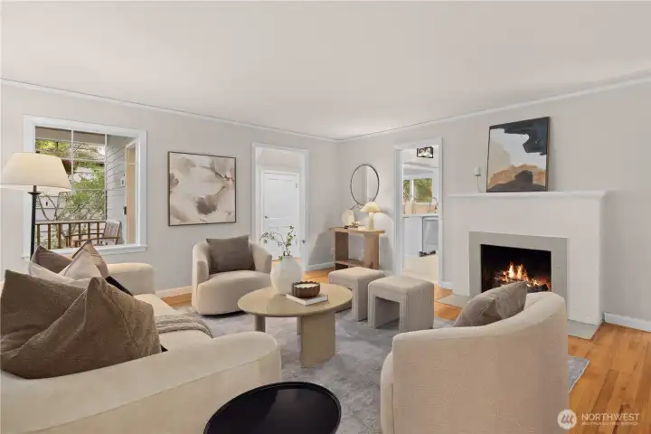 Wood burning fireplace in main floor living room. Wood burning fireplace in main floor living room.