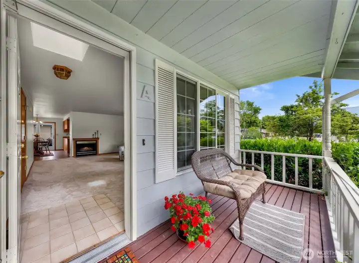 Cozy front porch invites you into the comfortable living room