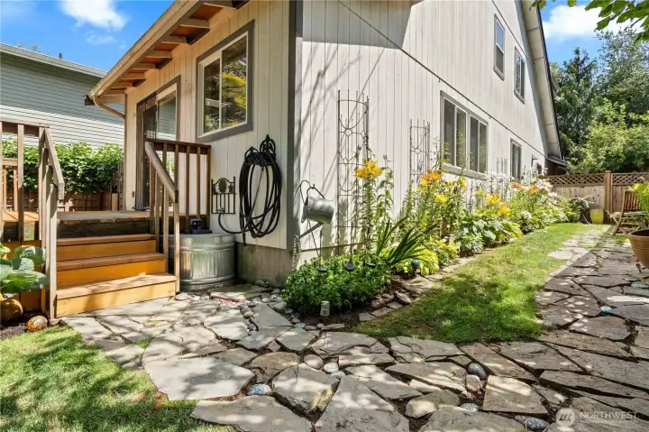 Paver path was installed by the owner and has beautiful hand-painted accents.