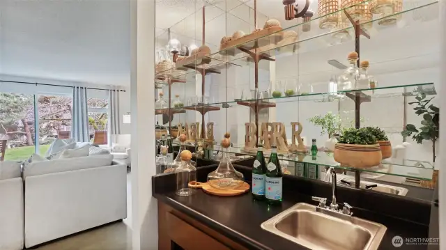 Wet bar between the kitchen and living area.