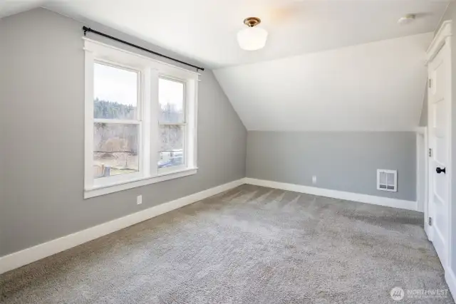 Upstair bedroom with view of Roslyn's forested Ridgeline.