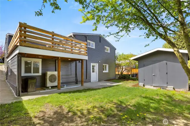 Sunny backyard space waiting for your personal touch!