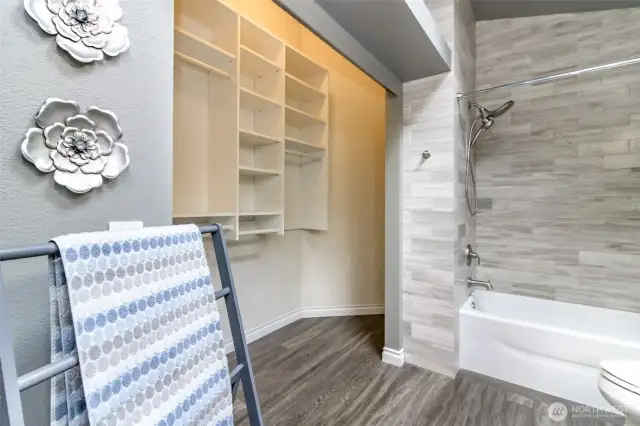 Lots of shelving and storage in the main closet area.