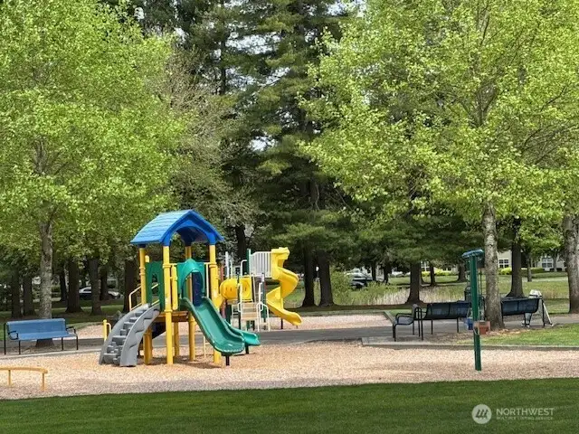 Beckonridge community park includes a playground, a cabana with grills/picnic tables and play fields.