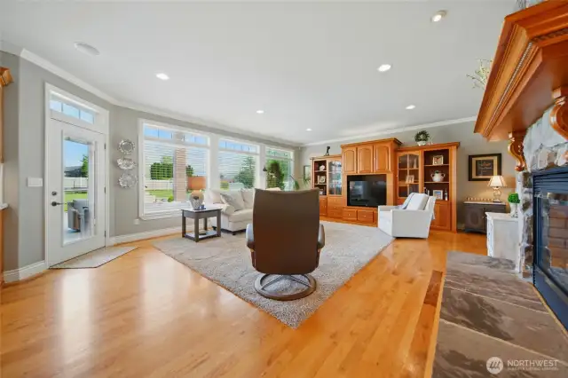Built in entertainment center, entry to back patio with storm door