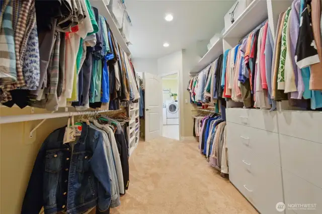 Primary closet from bathroom walk through to Laundry