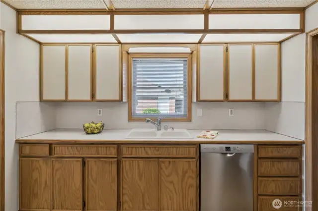 Kitchen with view to backyard & patio area.