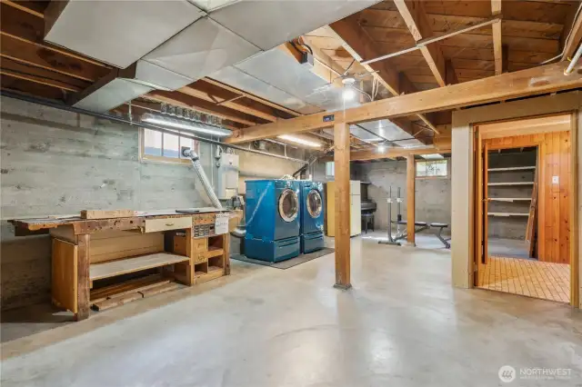 Front loading washer & dryer stay. Plenty of room for work shop or other hobbies.