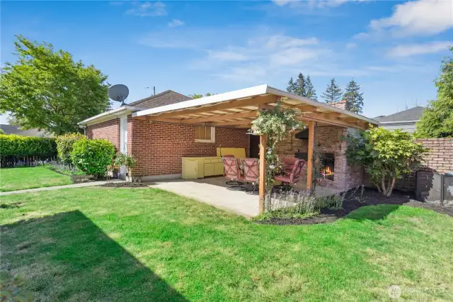 Outdoor entertaining central. Many gatherings have been enjoyed here throughout the years, Plenty of room for croquet too!