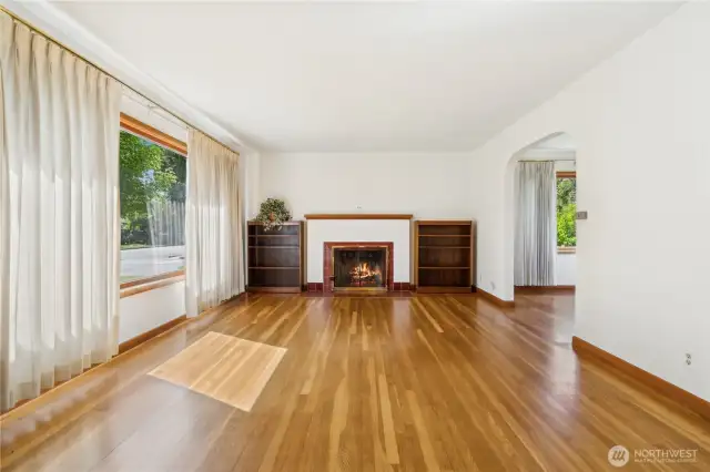 Beautiful orginal hardwood has been exposed. Stately mantle waiting for your decorating touch.