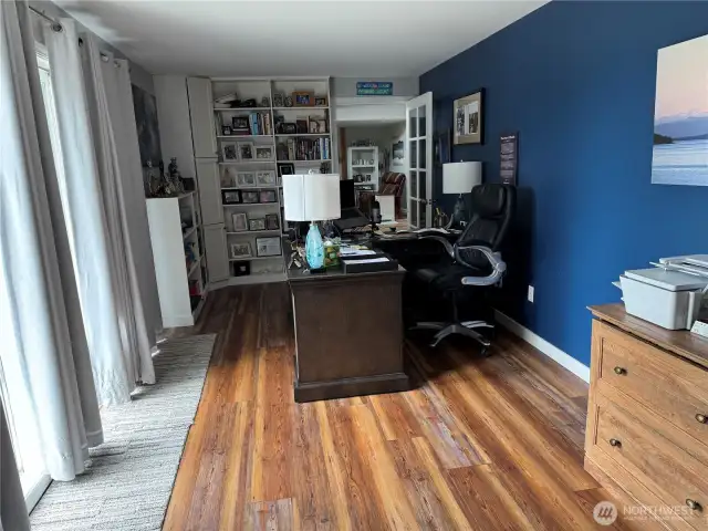 Office with 3/4 bathroom and entrance to shop
