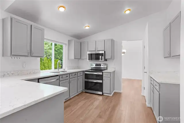 Updated counter tops and 1-year old appliances!